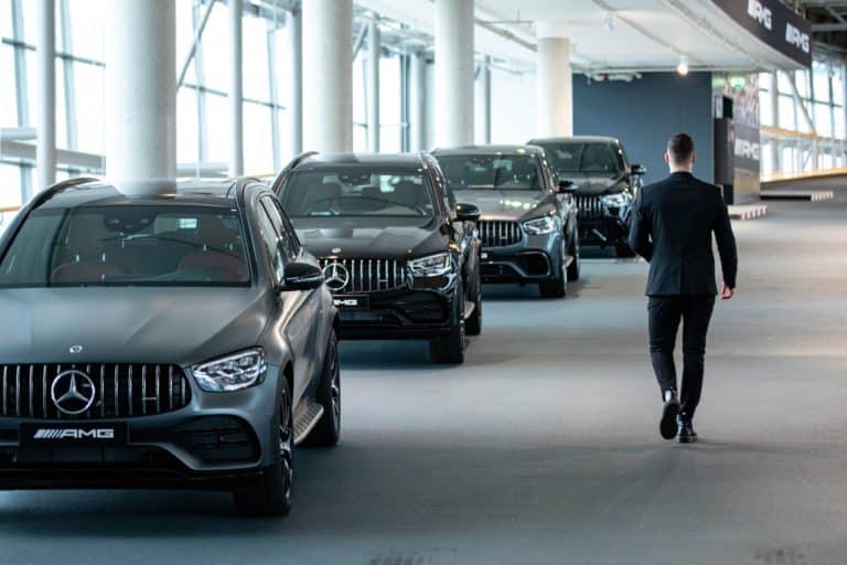 Automobiles on display inside a Mercedes-Benz AG showroom in Berlin, Germany, on Tuesday, Feb. 24, 2022. Mercedes-Benz expects profitability at its main cars division to slip this year as the German manufacturer sees more drag from supply-chain snarls and a surge in raw-material costs.