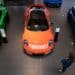 A customer looks at a Porsche GT3, left, a Porsche 911 Turbo, center, and a Porsche Taycan Turbo S automobile at a Porsche SE showroom in Berlin, Germany, on Tuesday, March 29, 2022. Porsche, which reports reports final year earnings today, delivered 301,915 vehicles to customers in 2021, an 11% jump from 2020 and the first time it has surpassed the 300,000 mark.