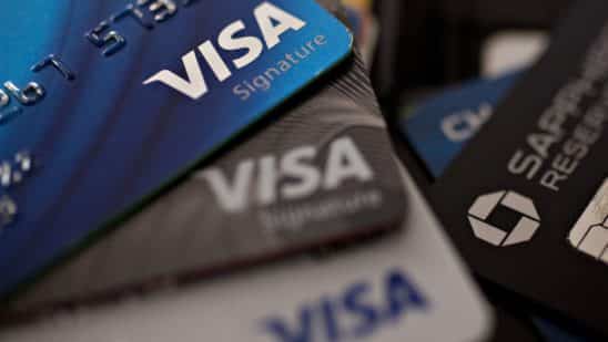 Visa Inc. credit cards are arranged for a photograph in Washington, D.C., U.S., on Monday, April 22, 2019. Visa Inc. is scheduled to release earnings figures on April 24.