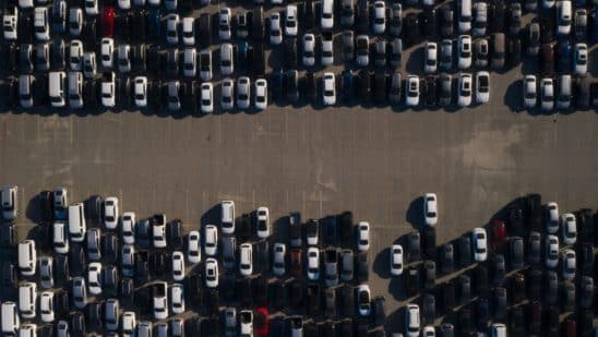 Rental cars are stored in a parking lot at Dodger Stadium in this aerial photograph taken over Los Angeles, California, U.S., on Wednesday, May 27, 2020. Hertz Global Holdings Inc. will sell as many of its rental cars as possible while in bankruptcy to bring its huge fleet in line with reduced future demand in a post-pandemic economy,the company's lead bankruptcy lawyer said during a court hearing Wednesday.