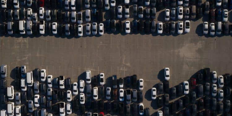 Rental cars are stored in a parking lot at Dodger Stadium in this aerial photograph taken over Los Angeles, California, U.S., on Wednesday, May 27, 2020. Hertz Global Holdings Inc. will sell as many of its rental cars as possible while in bankruptcy to bring its huge fleet in line with reduced future demand in a post-pandemic economy,the company's lead bankruptcy lawyer said during a court hearing Wednesday.