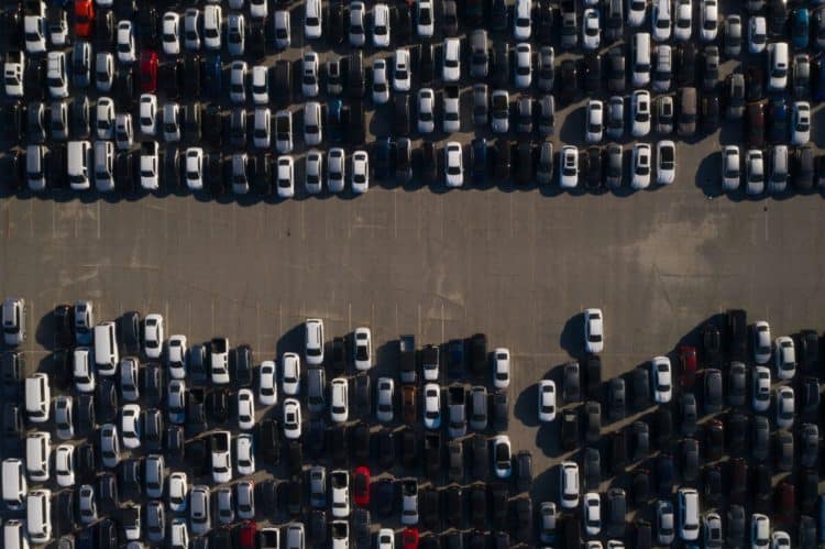 Rental cars are stored in a parking lot at Dodger Stadium in this aerial photograph taken over Los Angeles, California, U.S., on Wednesday, May 27, 2020. Hertz Global Holdings Inc. will sell as many of its rental cars as possible while in bankruptcy to bring its huge fleet in line with reduced future demand in a post-pandemic economy,the company's lead bankruptcy lawyer said during a court hearing Wednesday.