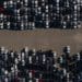 Rental cars are stored in a parking lot at Dodger Stadium in this aerial photograph taken over Los Angeles, California, U.S., on Wednesday, May 27, 2020. Hertz Global Holdings Inc. will sell as many of its rental cars as possible while in bankruptcy to bring its huge fleet in line with reduced future demand in a post-pandemic economy,the company's lead bankruptcy lawyer said during a court hearing Wednesday.