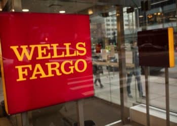 Signage at a Wells Fargo bank branch in New York, U.S., on Thursday, Jan. 13, 2022. Wells Fargo & Co. said it expects a key measure of lending to pick up this year, a sign that clients are starting to take on debt again as government stimulus wanes.