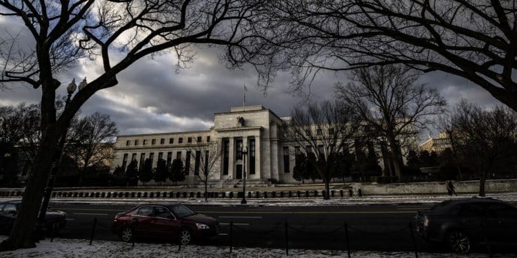 Fed downshifts to half-point hike, sees 5.1% rate next year