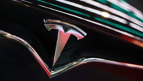 The Tesla Inc. logo is seen on the grille of a Model X electric vehicle at the Moscow Tesla Club in Moscow. Photographer: Andrey Rudakov/Bloomberg
