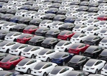 Tesla Inc. vehicles in a parking lot after arriving at a port in Yokohama, Japan, on Thursday, Oct. 28, 2022. Tesla, which was briefly a part of the trillion-dollar valuation group, currently has a market capitalization of about $650 billion.