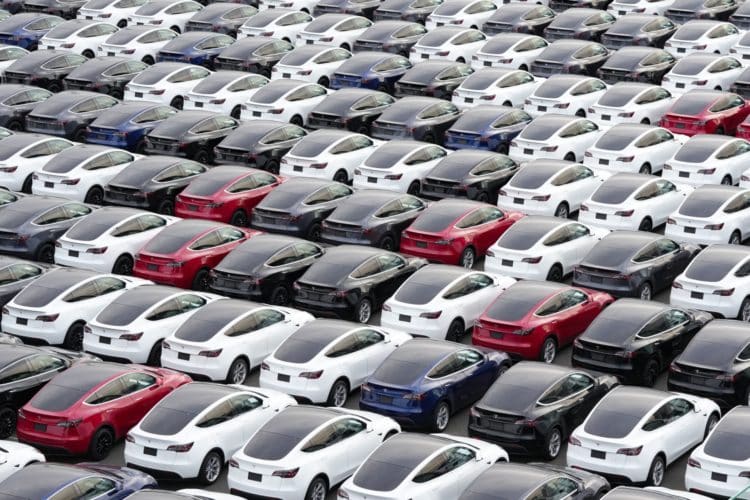Tesla Inc. vehicles in a parking lot after arriving at a port in Yokohama, Japan, on Thursday, Oct. 28, 2022. Tesla, which was briefly a part of the trillion-dollar valuation group, currently has a market capitalization of about $650 billion.