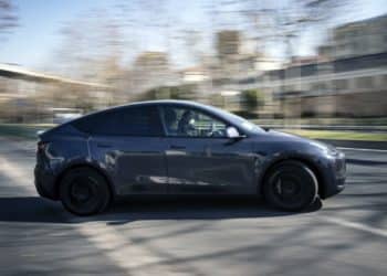 A Tesla Inc. Model Y electric vehicle leaves the automaker's showroom during a test drive in Shanghai, China, on Friday, Jan. 8, 2021. Tesla customers in China wanting to get the new locally made Model Y are facing a longer wait, signaling strong initial demand for the Shanghai-built SUV.