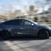 A Tesla Inc. Model Y electric vehicle leaves the automaker's showroom during a test drive in Shanghai, China, on Friday, Jan. 8, 2021. Tesla customers in China wanting to get the new locally made Model Y are facing a longer wait, signaling strong initial demand for the Shanghai-built SUV.