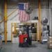 A worker operates a forklift at a manufacturing facility in Virginia Beach, Virginia. Photographer: Luke Sharrett/Bloomberg