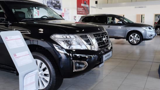 CARS IN DEALER SHOWROOM