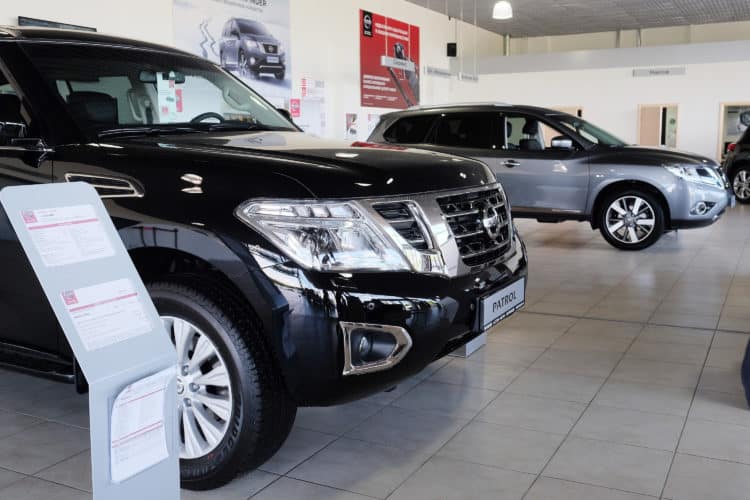CARS IN DEALER SHOWROOM
