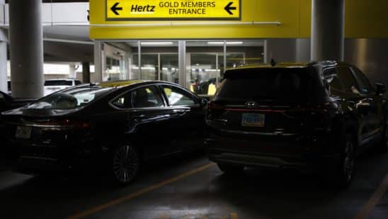 Rental vehicles parked at a Hertz location at the Louisville International Airport in Louisville, Kentucky, U.S., on Thursday, Jan. 20, 2022. The U.S. car rental industry achieved overall revenues of $28.1 billion in 2021 - a 21% gain over the pandemic year of 2020, according to data collected by Auto Rental News. Photographer: Luke Sharrett/Bloomberg