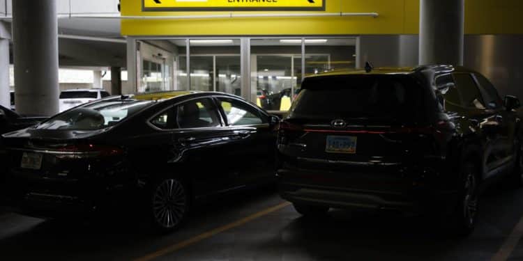 Rental vehicles parked at a Hertz location at the Louisville International Airport in Louisville, Kentucky, U.S., on Thursday, Jan. 20, 2022. The U.S. car rental industry achieved overall revenues of $28.1 billion in 2021 - a 21% gain over the pandemic year of 2020, according to data collected by Auto Rental News. Photographer: Luke Sharrett/Bloomberg