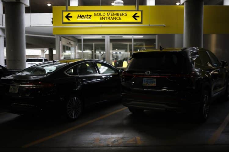 Rental vehicles parked at a Hertz location at the Louisville International Airport in Louisville, Kentucky, U.S., on Thursday, Jan. 20, 2022. The U.S. car rental industry achieved overall revenues of $28.1 billion in 2021 - a 21% gain over the pandemic year of 2020, according to data collected by Auto Rental News. Photographer: Luke Sharrett/Bloomberg