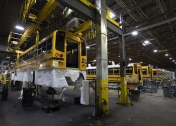 The Lion C electric school bus is assembled at the Lion Electric assembly plant in Saint-Jerome, Quebec, Canada, on Thursday, Oct. 13, 2022. Lion Electric Co. designs, develops, manufactures, and distributes purpose-built all-electric medium and heavy-duty urban vehicles, including seven mid range truck and bus models. Photographer: Christinne Muschi/Bloomberg