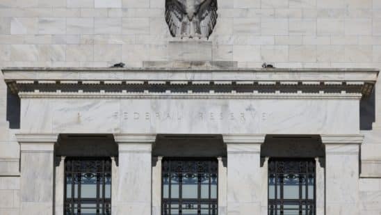 Fed slows rate hikes, signals further increases are coming