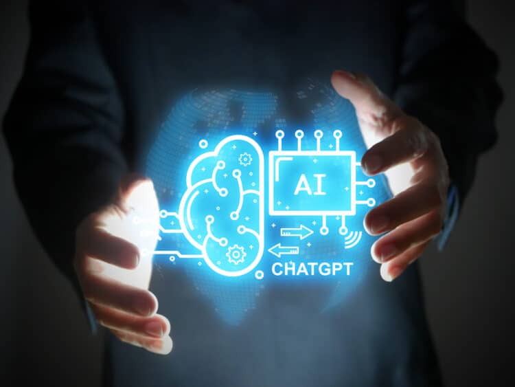 A Businessman Has A Virtual Graphic Of Chatgpt In His Hand. Chatbot, Chat With Ai, Artificial