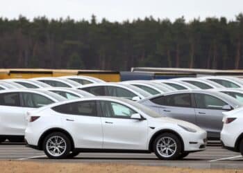 Tesla Model Y electric vehicles in a lot at the Tesla Inc. Gigafactory in Gruenheide, Germany, on Saturday, Jan. 21, 2023. Tesla CEO Elon Musk played down how much impact his tweets have on the company's stock price as he defended himself at a trial in San Francisco federal court on Friday over his 2018 tweet about taking the electric car-maker private.