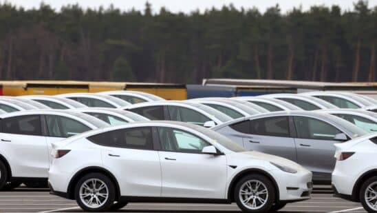 Tesla Model Y electric vehicles in a lot at the Tesla Inc. Gigafactory in Gruenheide, Germany, on Saturday, Jan. 21, 2023. Tesla CEO Elon Musk played down how much impact his tweets have on the company's stock price as he defended himself at a trial in San Francisco federal court on Friday over his 2018 tweet about taking the electric car-maker private.
