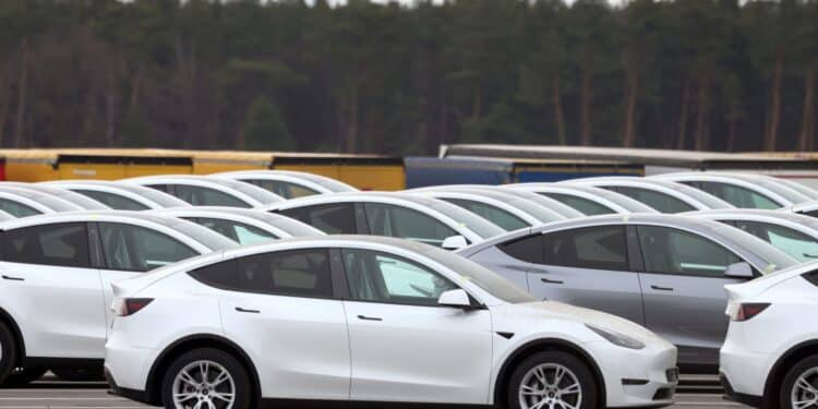Tesla Model Y electric vehicles in a lot at the Tesla Inc. Gigafactory in Gruenheide, Germany, on Saturday, Jan. 21, 2023. Tesla CEO Elon Musk played down how much impact his tweets have on the company's stock price as he defended himself at a trial in San Francisco federal court on Friday over his 2018 tweet about taking the electric car-maker private.