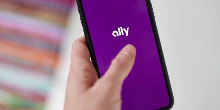 The Ally Financial Inc. logo on a smartphone arranged in Saint Thomas, Virgin Islands, United States, on Friday, Jan. 22, 2021. Ally Financial Inc. fell 5.3%, more than any full-day loss since June 26 as its sector declined.