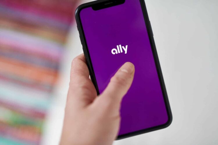 The Ally Financial Inc. logo on a smartphone arranged in Saint Thomas, Virgin Islands, United States, on Friday, Jan. 22, 2021. Ally Financial Inc. fell 5.3%, more than any full-day loss since June 26 as its sector declined.