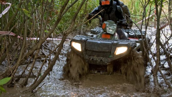ATV riding through mud