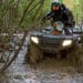 ATV riding through mud