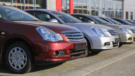 Cars in a row on dealer lot