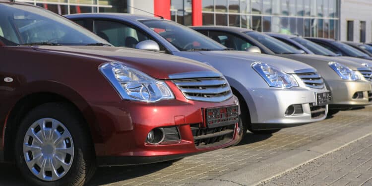 Cars in a row on dealer lot