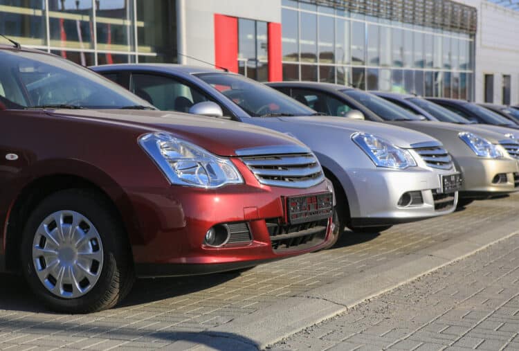 Cars in a row on dealer lot