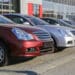 Cars in a row on dealer lot