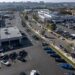 A Ford dealership in Richmond, California, U.S., on Wednesday, Jan. 26, 2022. U.S. auto sales will climb just 3.4% this year to 15.4 million cars and trucks as the semiconductor shortages continue to constrain vehicle inventory, auto dealers predict.