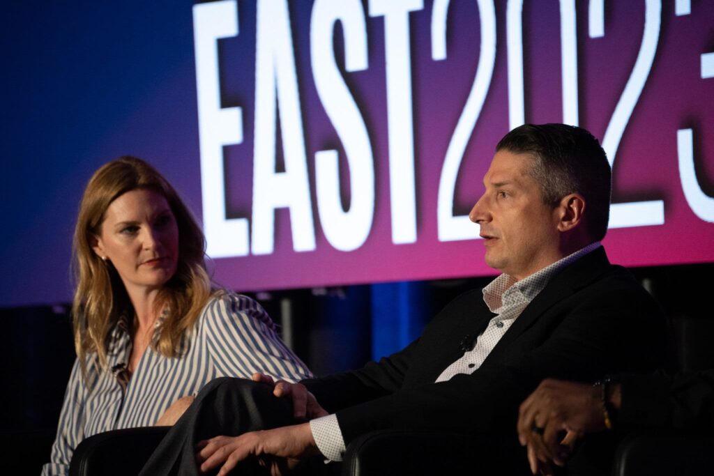 Heidi Burn, Flagship Credit Acceptance, sits with Anthony Capizanno, Axos Bank, during a panel discussion at Auto Finance Summit East in Nashville.