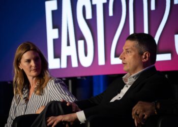 Heidi Burn, Flagship Credit Acceptance, sits with Anthony Capizanno, Axos Bank, during a panel discussion at Auto Finance Summit East in Nashville.