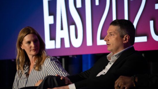 Heidi Burn, Flagship Credit Acceptance, sits with Anthony Capizanno, Axos Bank, during a panel discussion at Auto Finance Summit East in Nashville.