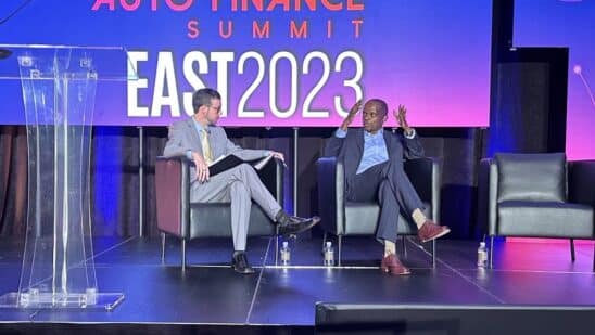 Joey Pizzolato and Peter Muriungi on stage at AFS East in Nashville, Tenn.