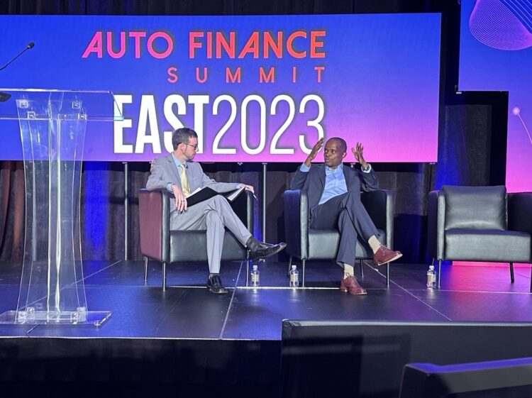 Joey Pizzolato and Peter Muriungi on stage at AFS East in Nashville, Tenn.