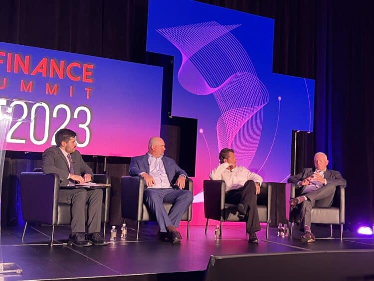 Stage at Auto Finance East during subprime panel