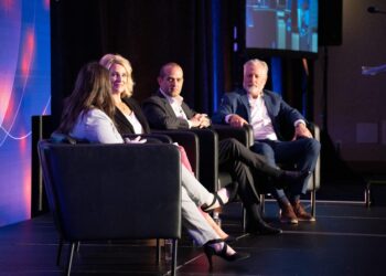 Panelists on the stage at Auto Finance Summit East