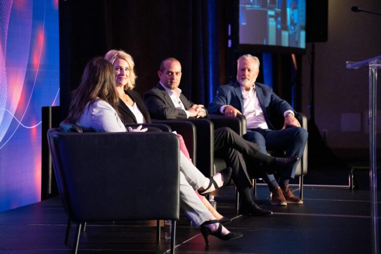 Panelists on the stage at Auto Finance Summit East