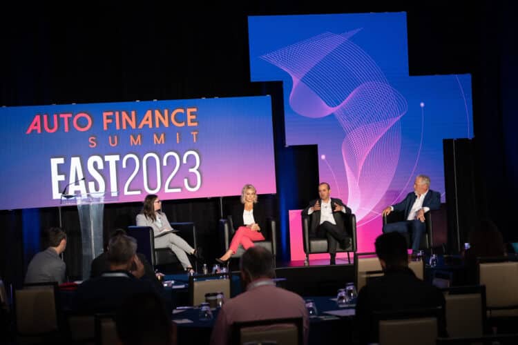 Panelists on the stage at Auto Finance Summit East