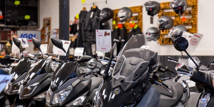 various models of motorcycles displayed in a dealership