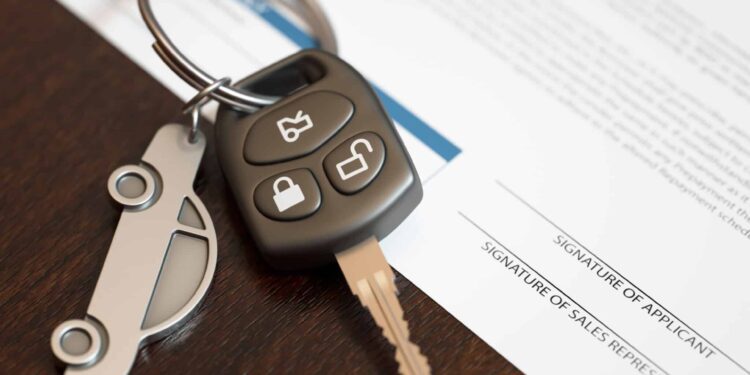 Car loan application with car keys. Capture rates drop amid credit degradation at Automotive Credit