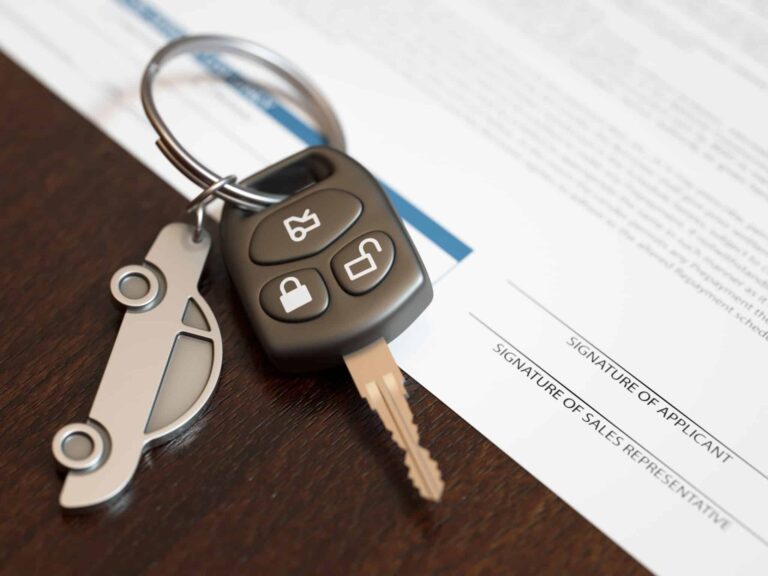 Car loan application with car keys. Capture rates drop amid credit degradation at Automotive Credit
