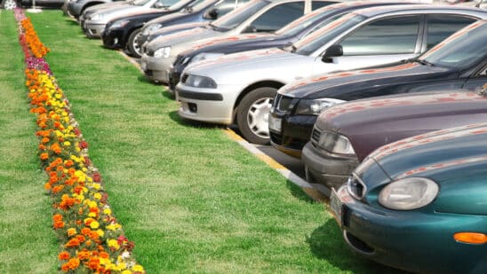 Row of cars parked next to each other
