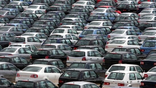Cars parked closely together in a lot