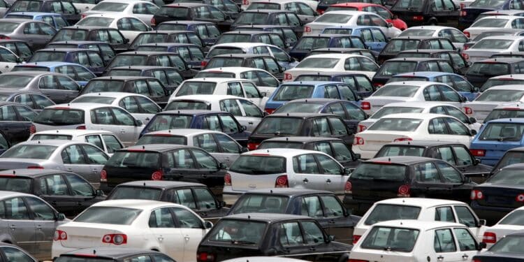 Cars parked closely together in a lot